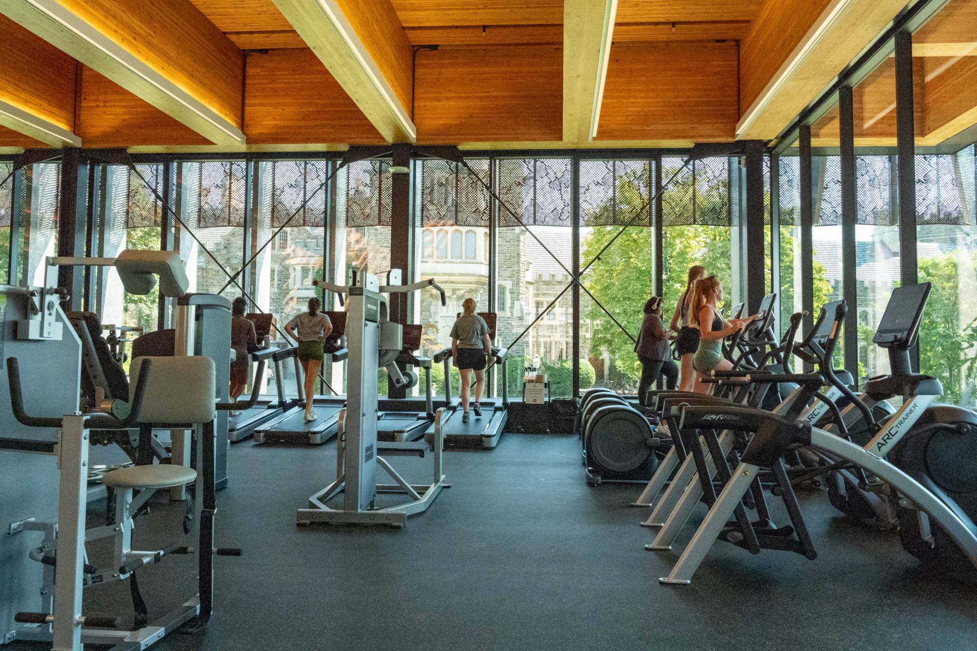 Students use fitness equipment 